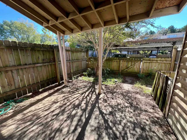 a view of a terrace with chairs