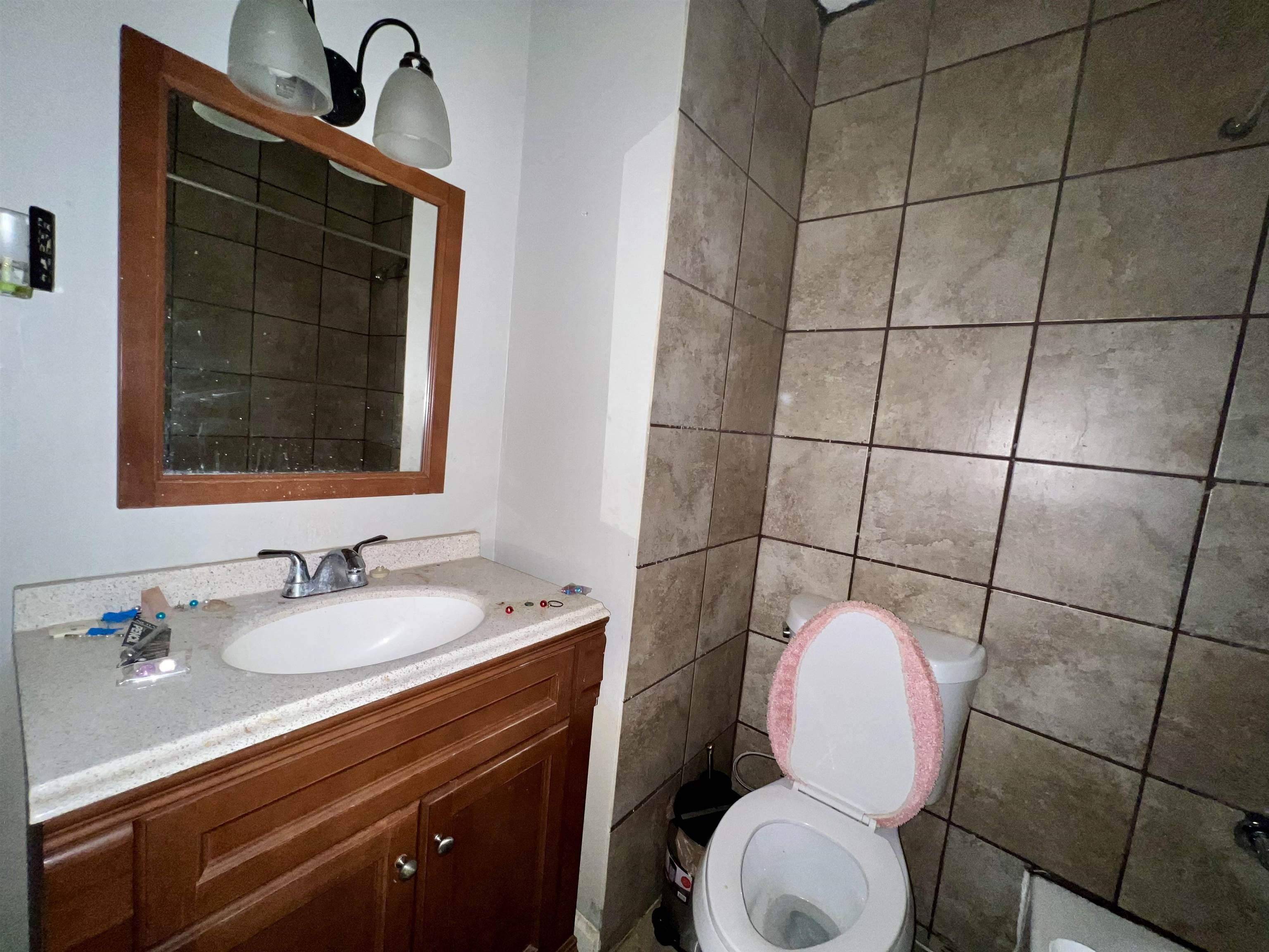 5573 Pleasant View Road, Unit 35 Memphis, TN 38134 - Photo 3 of 18 a bathroom with a sink toilet and shower