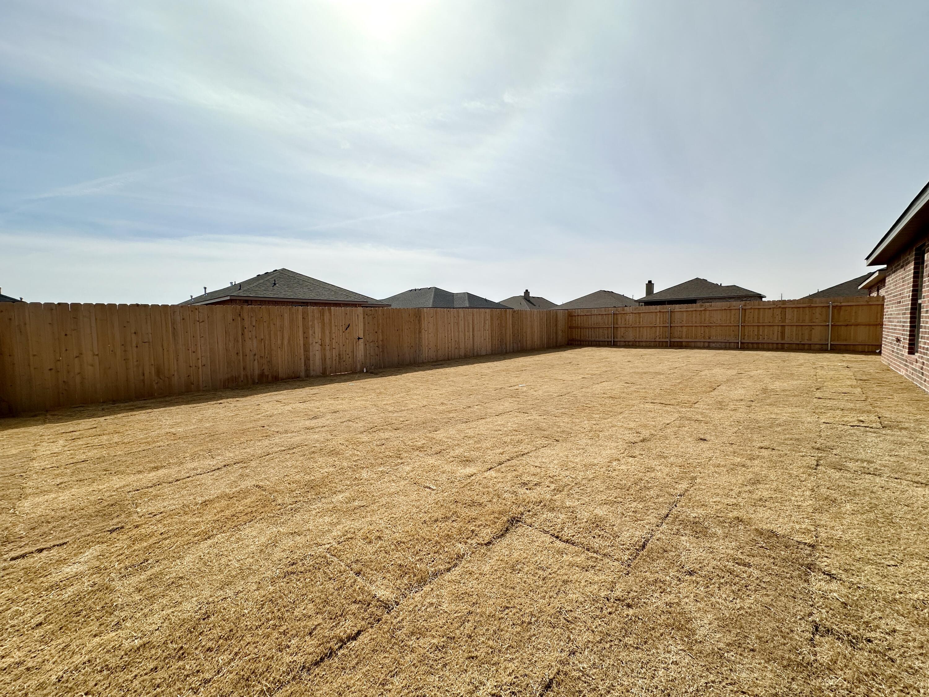 7449 28th Street Lubbock, TX 79407 - Photo 11 of 11 a view of wooden fence