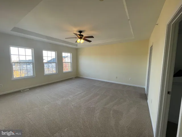 a kitchen with stainless steel appliances granite countertop a stove top oven a sink a counter top space and cabinets