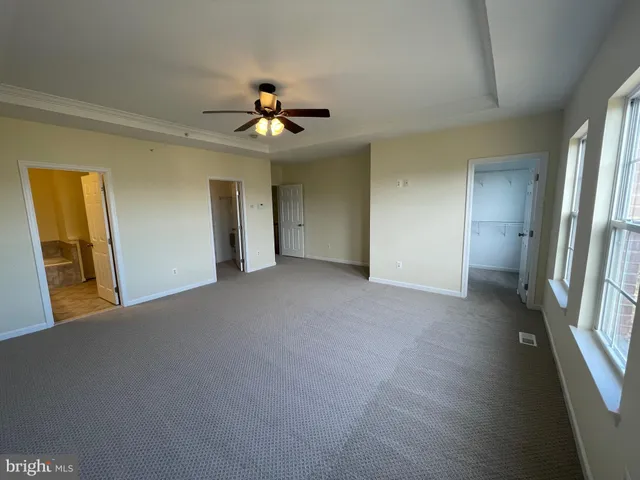 a kitchen with stainless steel appliances granite countertop a stove top oven a sink and dishwasher