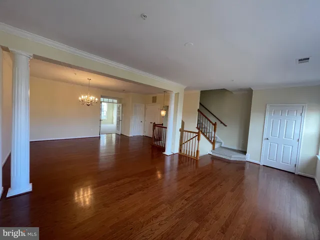 a view of a house with swimming pool and sitting area