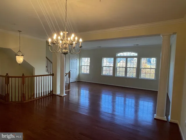 a view of a building with outdoor seating