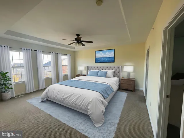 a view of a hallway with wooden floor and stairs