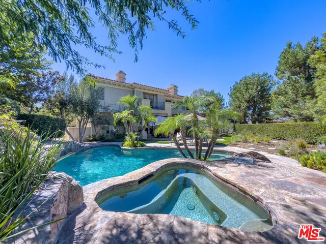 a view of yard from a tub