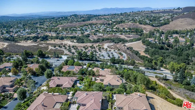 an aerial view of a city with lots of residential buildings