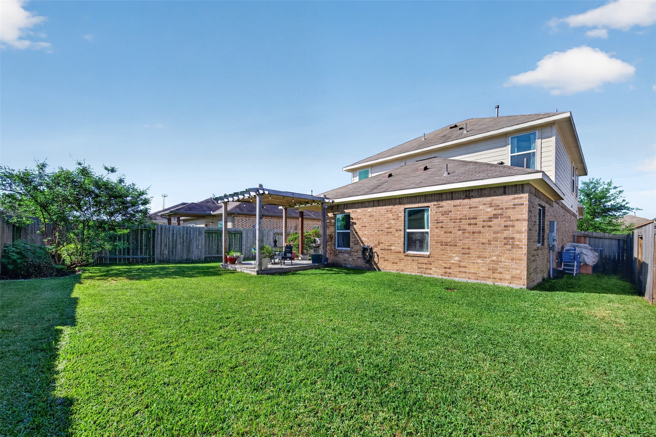 8630 Willet Street Baytown, TX 77521 - Photo 46 of 49 lush, fenced backyard