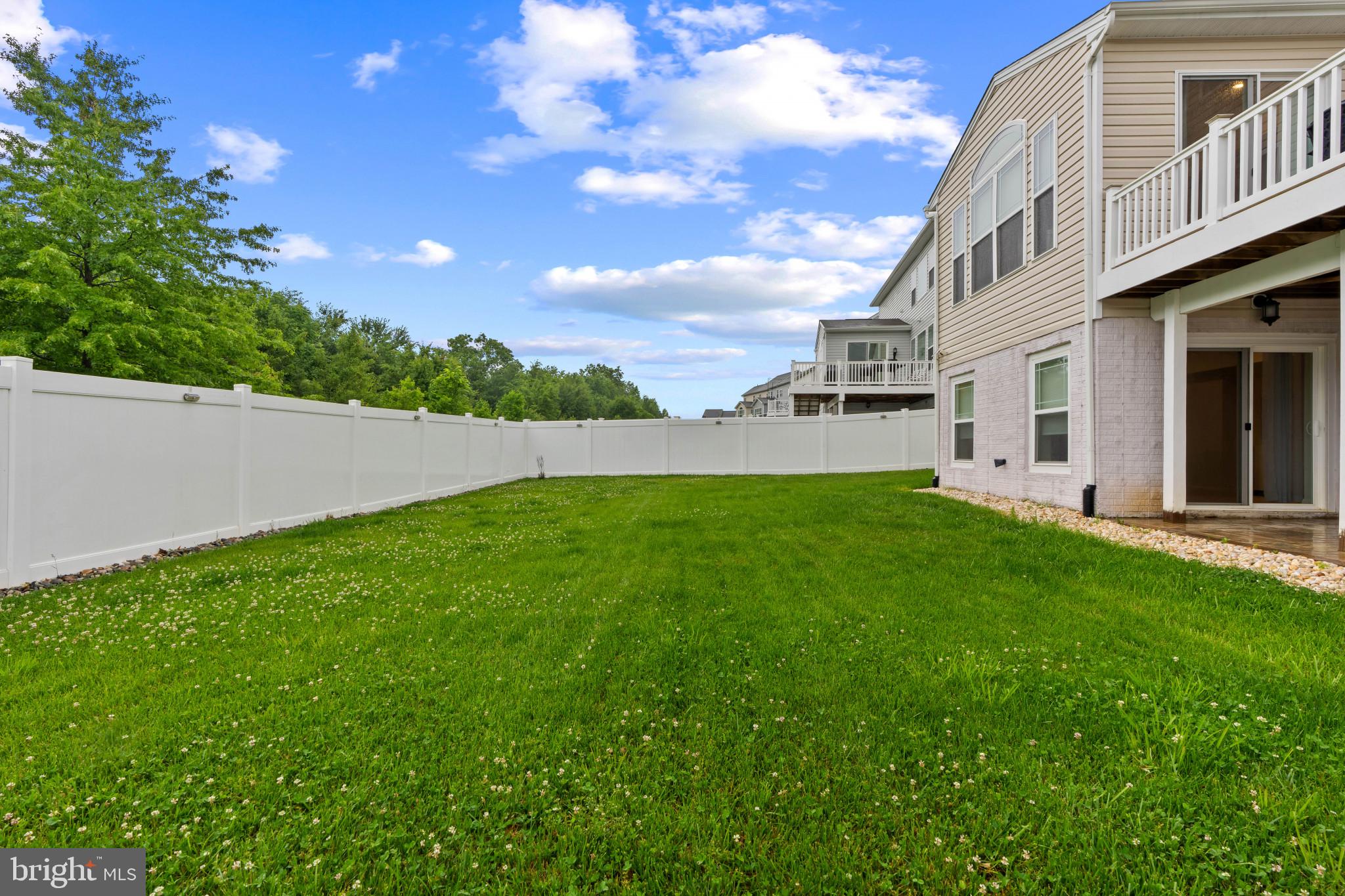 703 Perception Way Aberdeen, MD 21001 - Photo 30 of 42 a view of yard with swimming pool and green space
