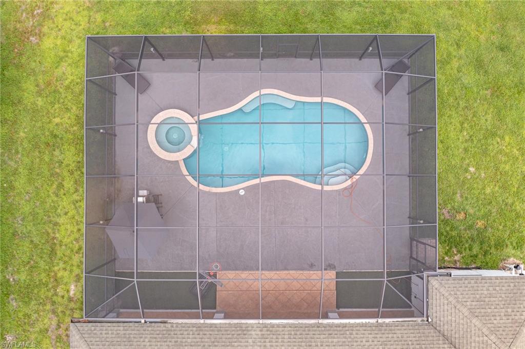 160 Logan Boulevard South Naples, FL 34119 - Photo 28 of 49 Bird's eye view of a pool