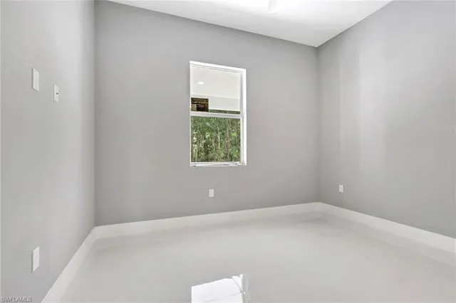 an empty room with a window