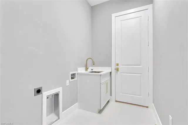 a bathroom with a sink and vanity