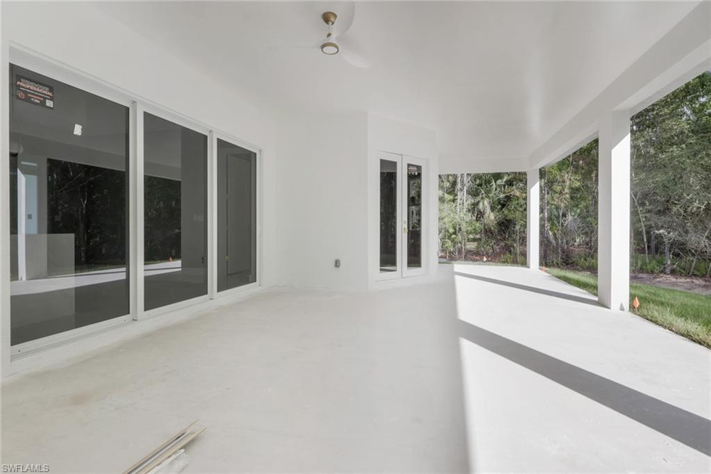 160 Logan Boulevard South Naples, FL 34119 - Photo 47 of 49 View of patio featuring ceiling fan