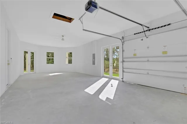 a view of a big room with closet and windows