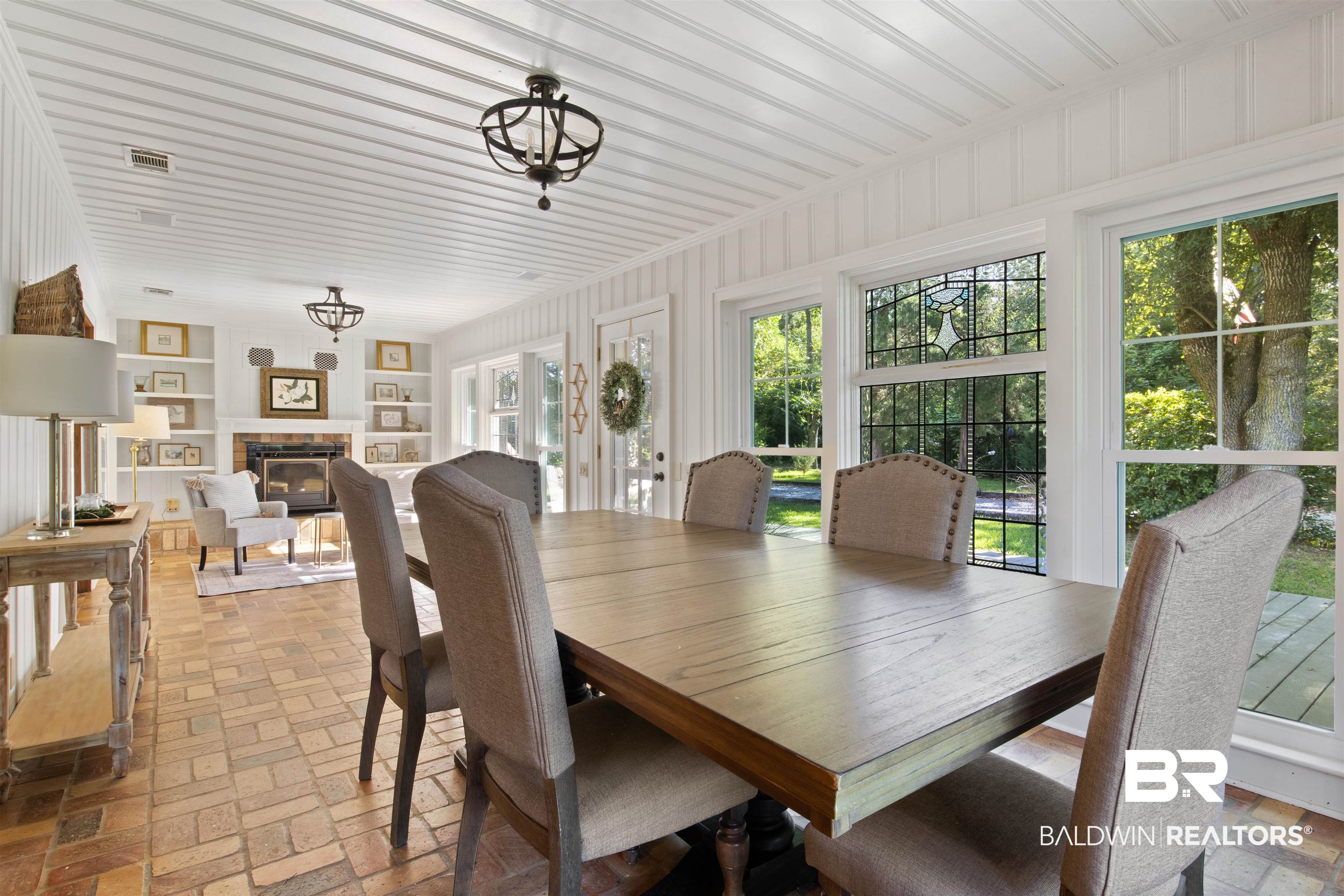 15100 Vasko Road Silverhill, AL 36576 - Photo 14 of 51 Dining area with built in shelves and fireplace.