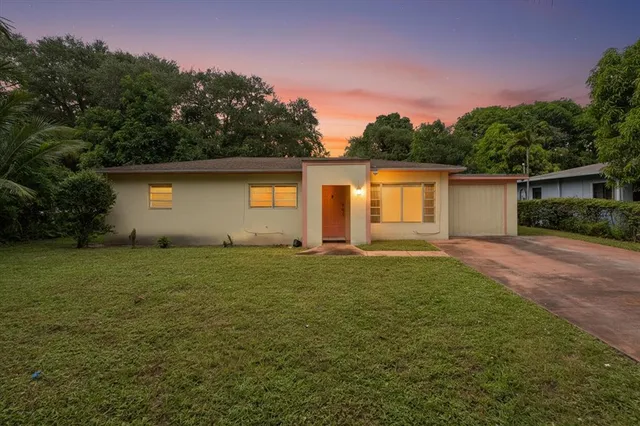 a house view with a garden space