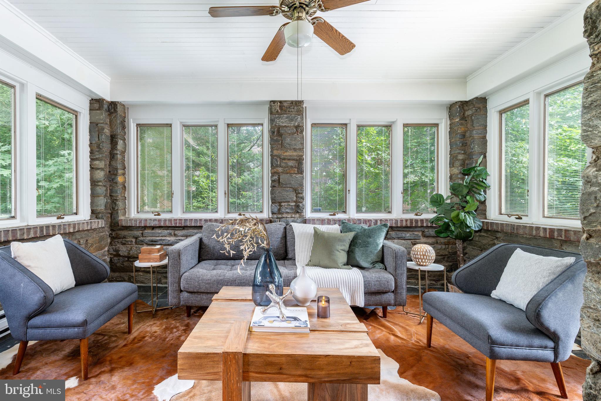 1419 County Line Road Bryn Mawr, PA 19010 - Photo 20 of 65 a living room with furniture and a large window