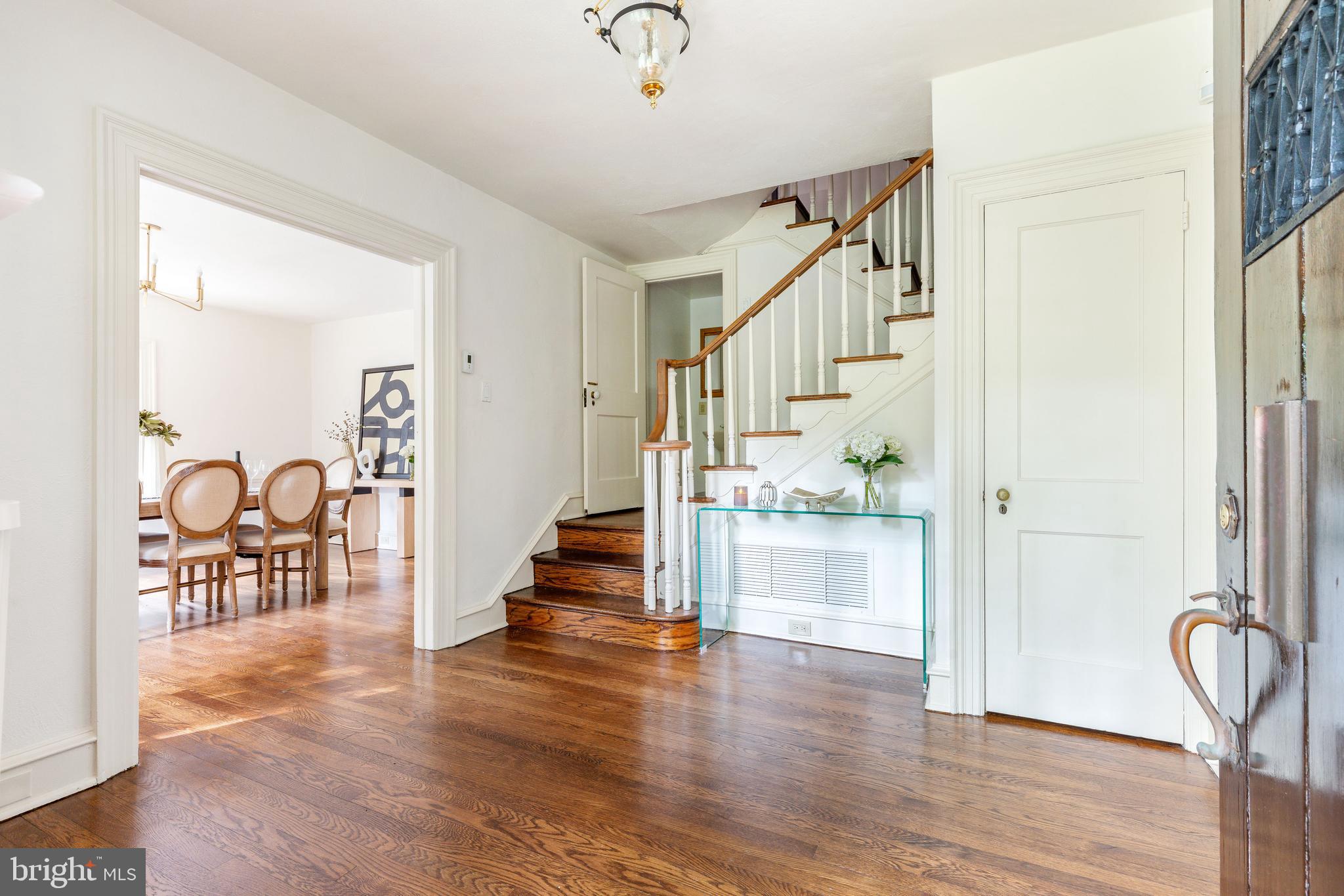 1419 County Line Road Bryn Mawr, PA 19010 - Photo 21 of 65 a view of an entryway with wooden floor and a livingroom view