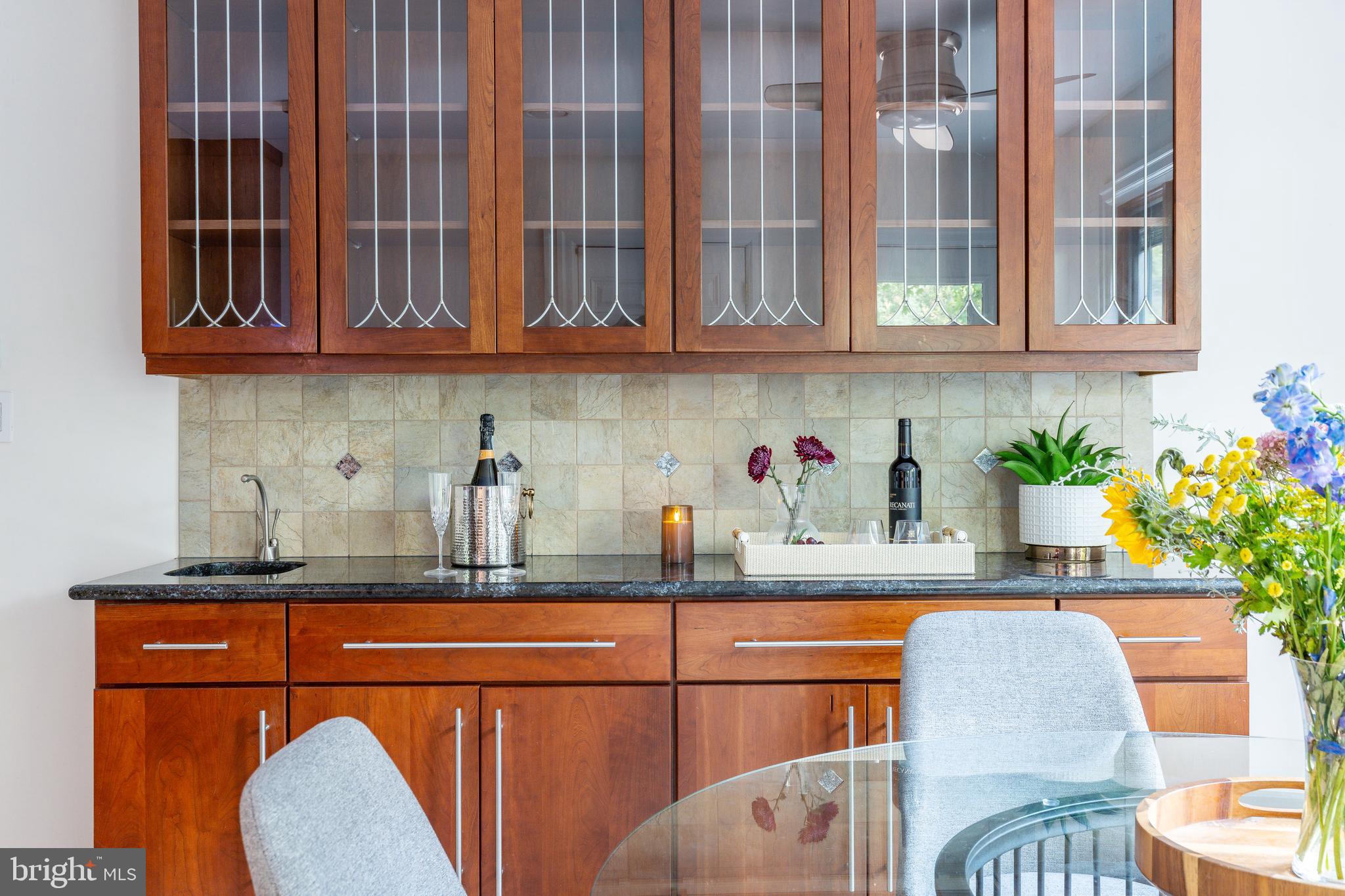 1419 County Line Road Bryn Mawr, PA 19010 - Photo 25 of 65 a kitchen with stainless steel appliances granite countertop a sink and a microwave