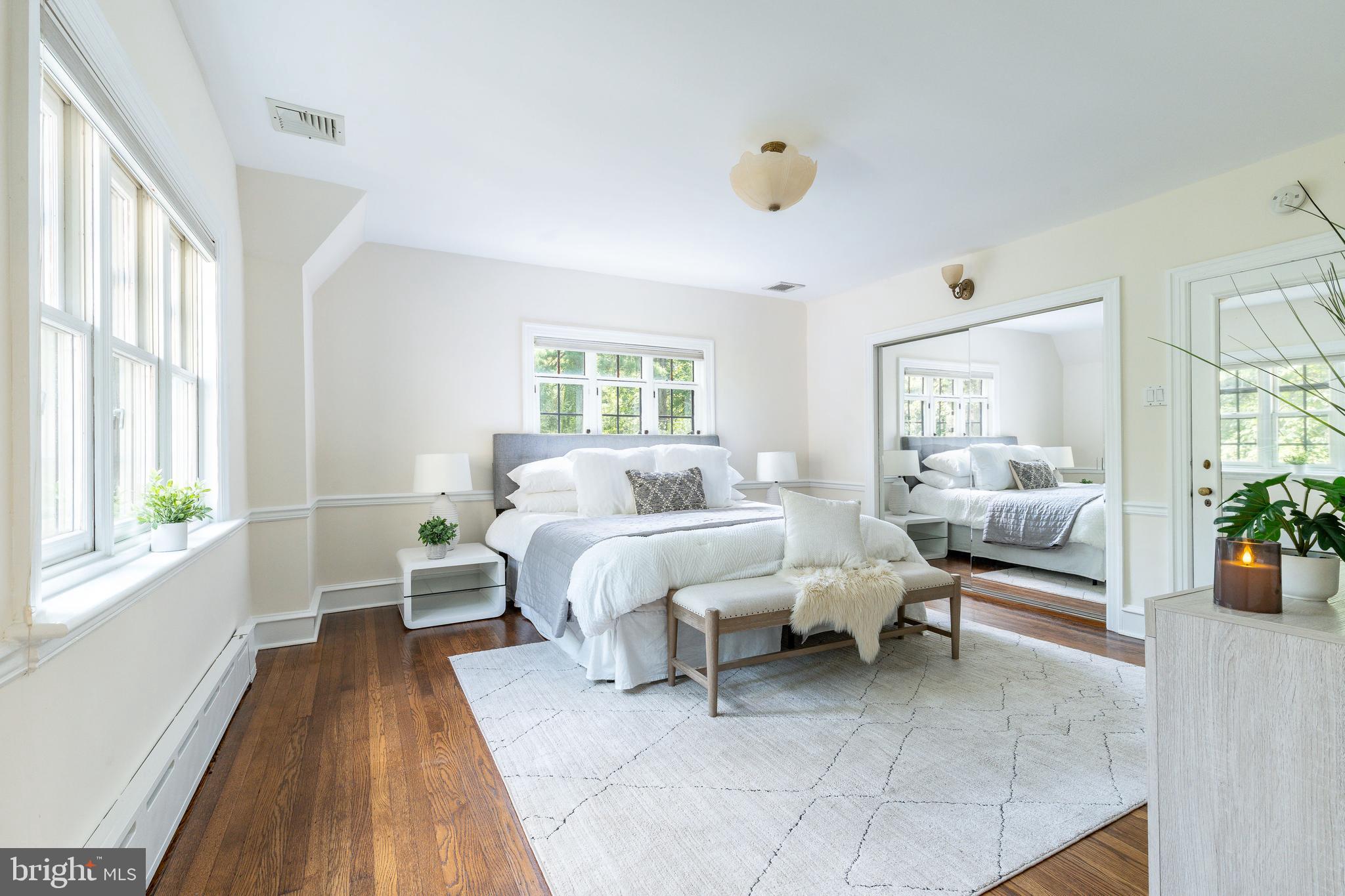 1419 County Line Road Bryn Mawr, PA 19010 - Photo 31 of 65 a living room with furniture and a large window