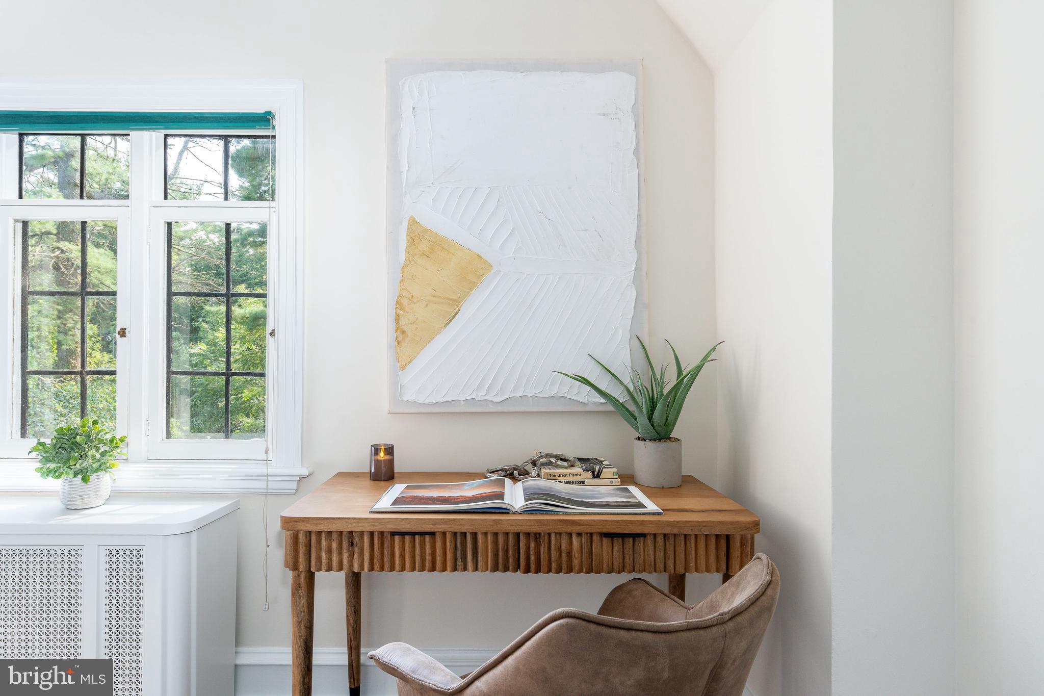 1419 County Line Road Bryn Mawr, PA 19010 - Photo 38 of 65 a view of a house with a table and chair