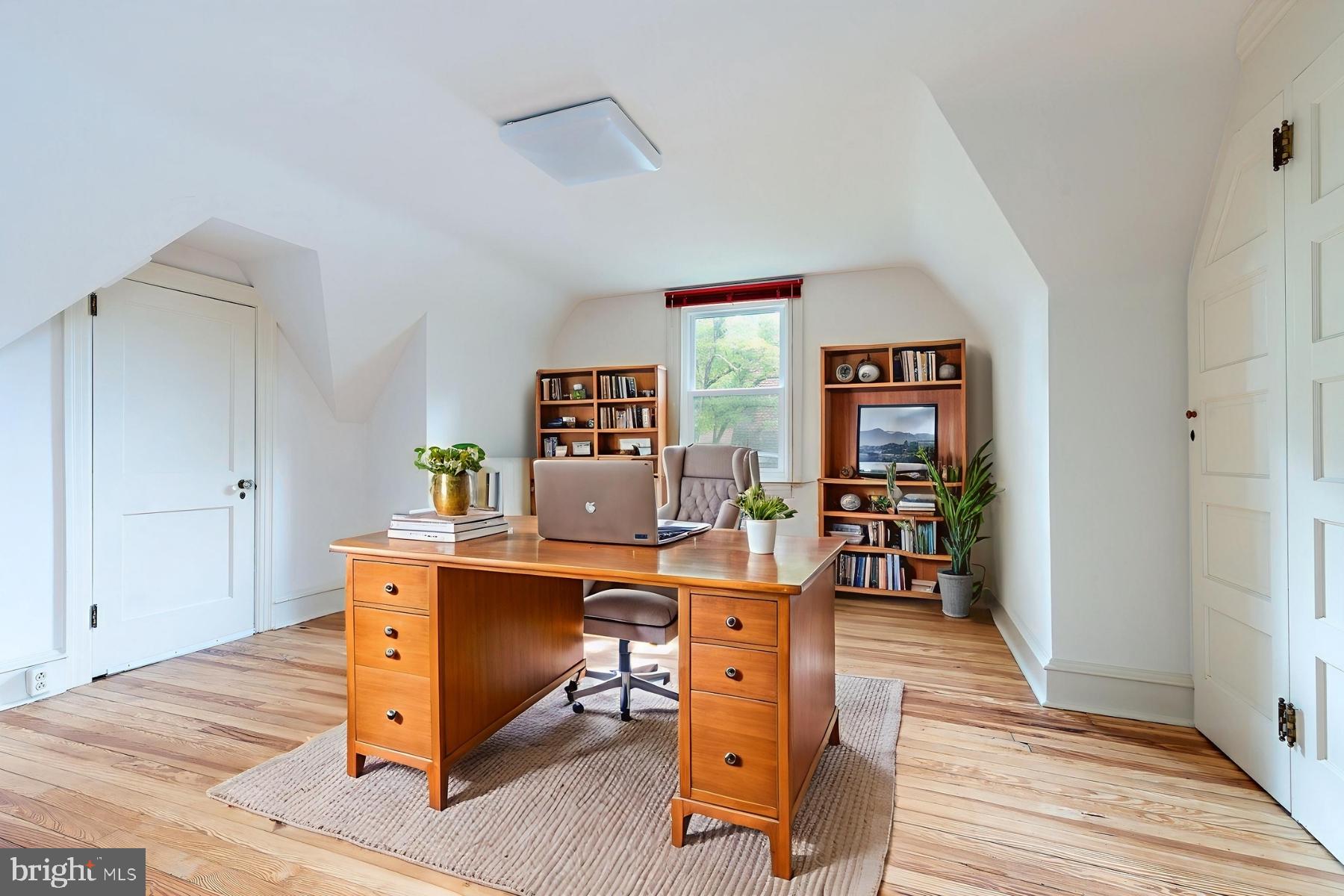 1419 County Line Road Bryn Mawr, PA 19010 - Photo 45 of 65 a view of a workspace with furniture and a window