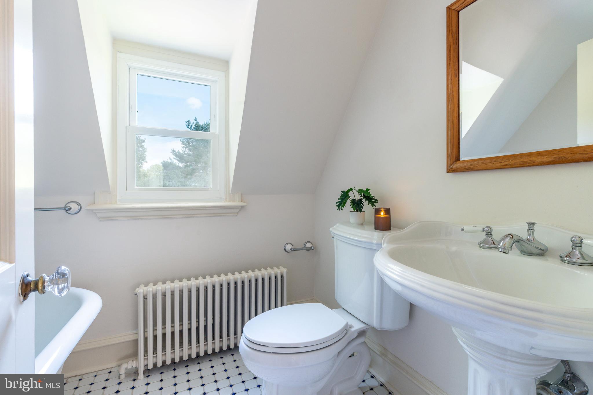 1419 County Line Road Bryn Mawr, PA 19010 - Photo 46 of 65 a bathroom with a sink toilet and shower