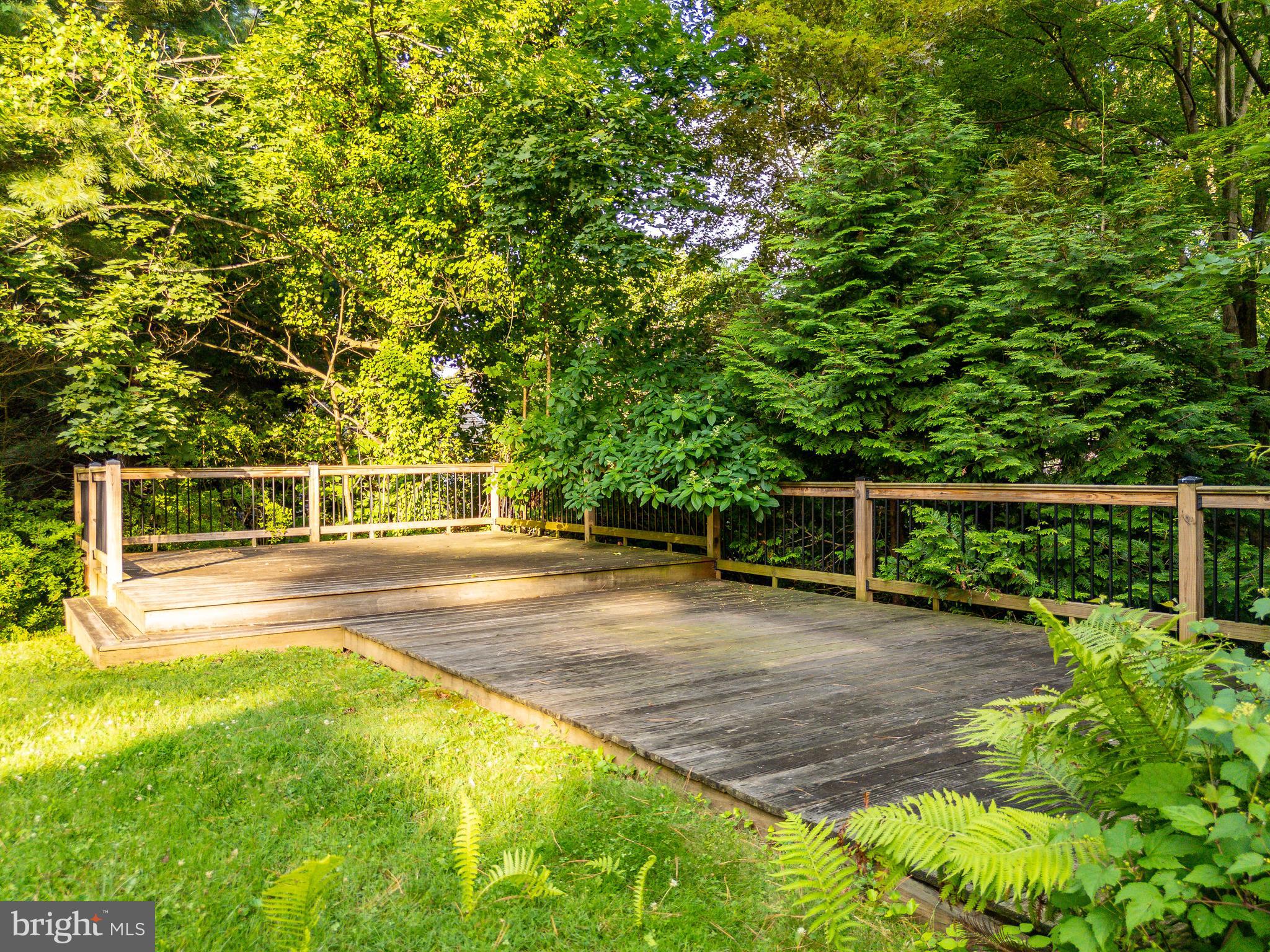 1419 County Line Road Bryn Mawr, PA 19010 - Photo 53 of 65 a view of a yard with wooden fence