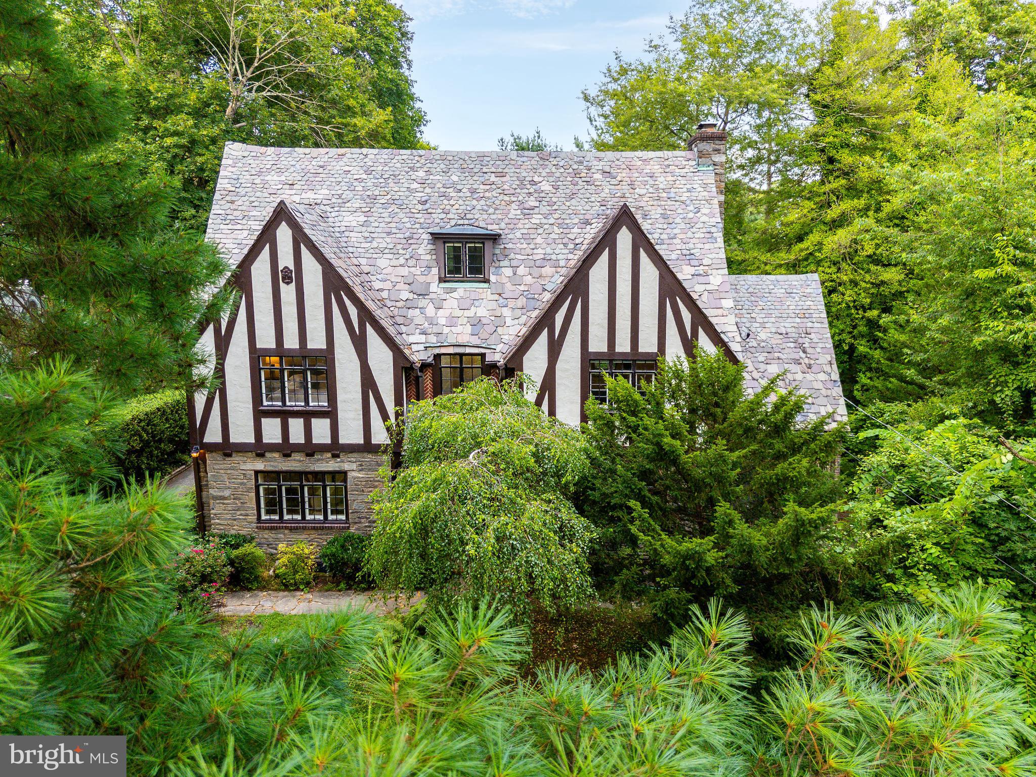1419 County Line Road Bryn Mawr, PA 19010 - Photo 55 of 65 a aerial view of a house with balcony and trees al around