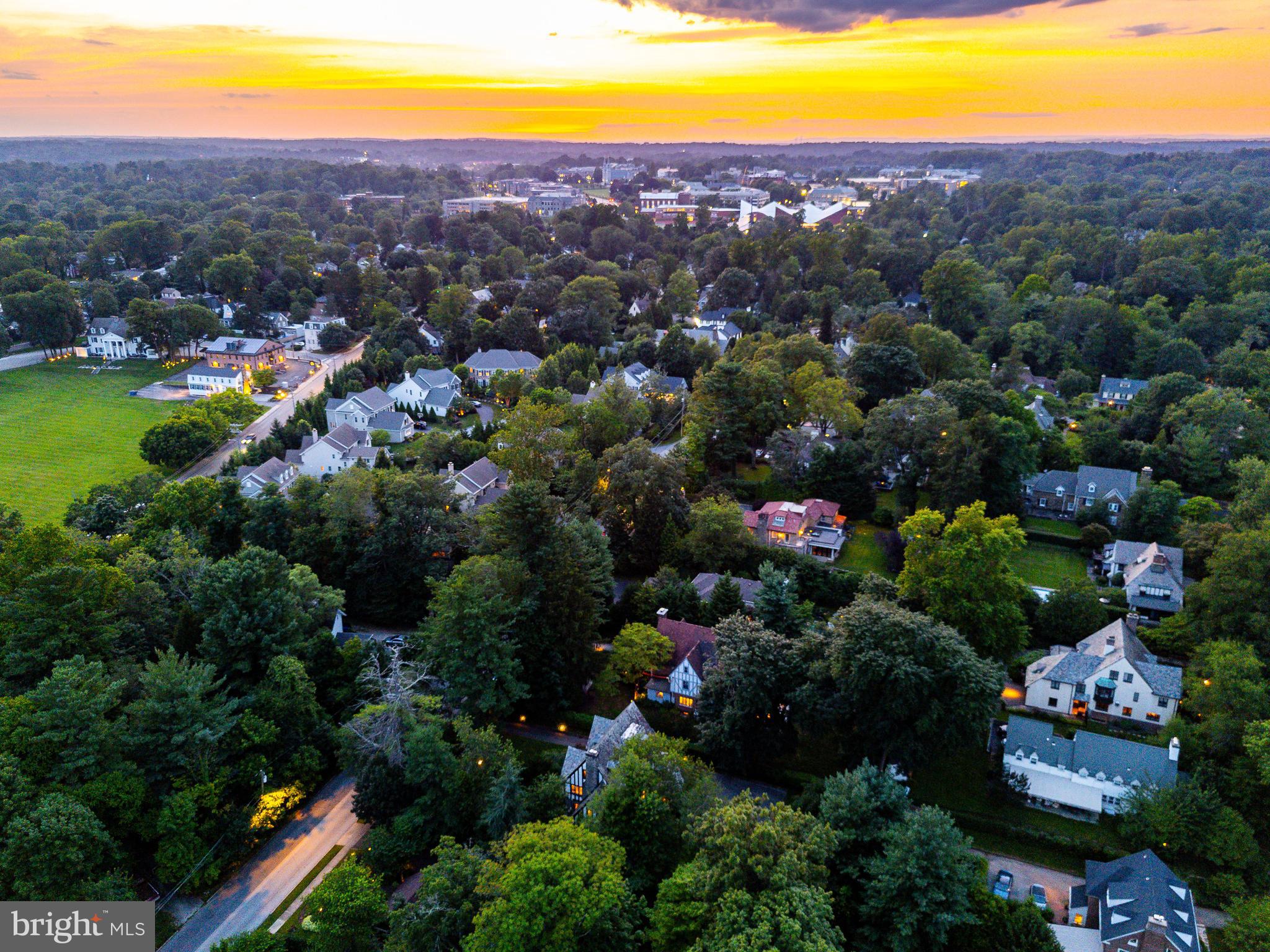 1419 County Line Road Bryn Mawr, PA 19010 - Photo 63 of 65 an aerial view of residential houses with outdoor space and swimming pool
