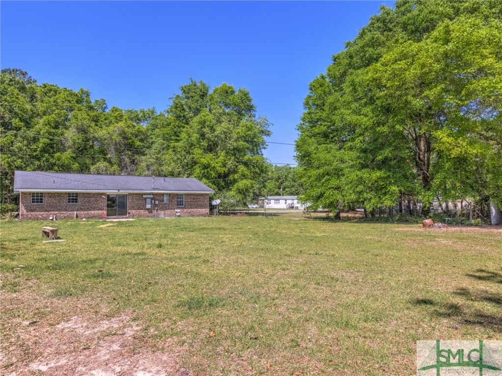 207 Tunnel Road Springfield, GA 31329 - Photo 2 of 19 Back