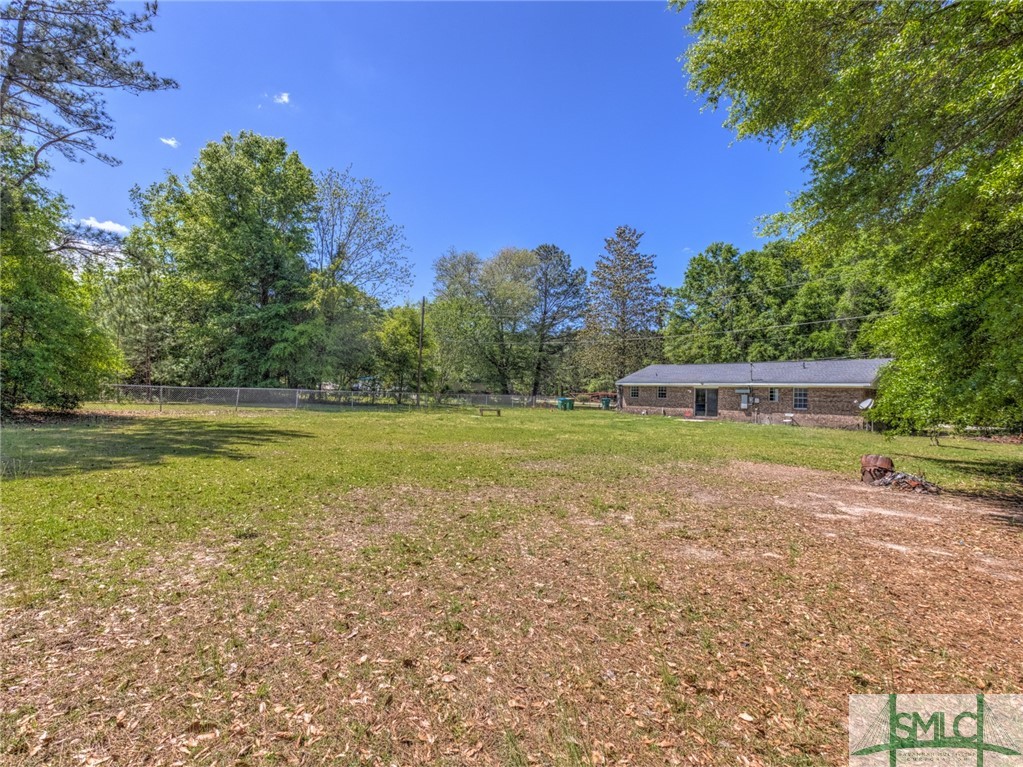 207 Tunnel Road Springfield, GA 31329 - Photo 3 of 19 Backyard