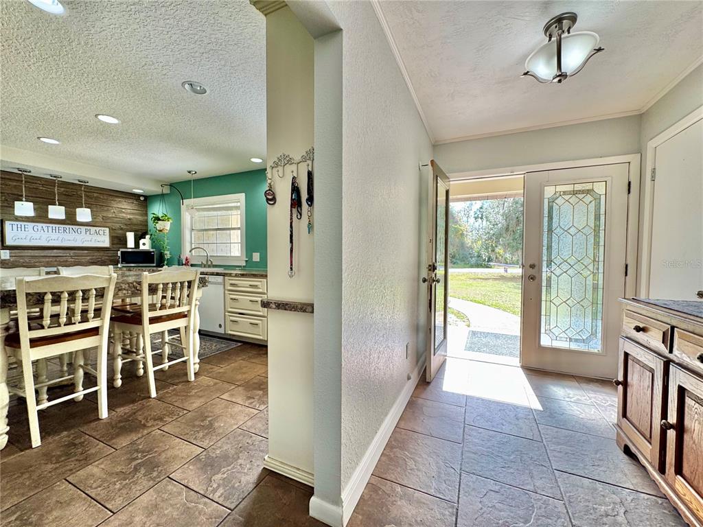 7625 East Misty Lane Inverness, FL 34450 - Photo 15 of 58 a view of a kitchen with furniture and windows
