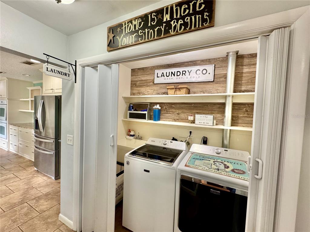 7625 East Misty Lane Inverness, FL 34450 - Photo 23 of 58 a utility room with washer and dryer