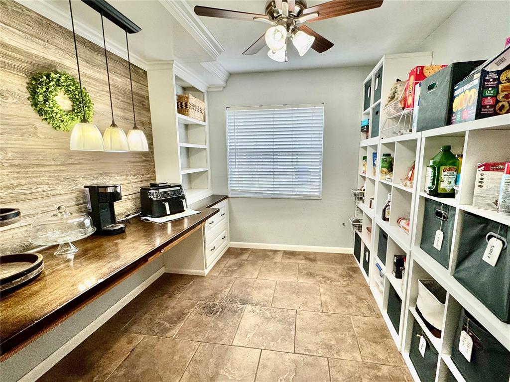 7625 East Misty Lane Inverness, FL 34450 - Photo 26 of 58 a hallway with cabinets