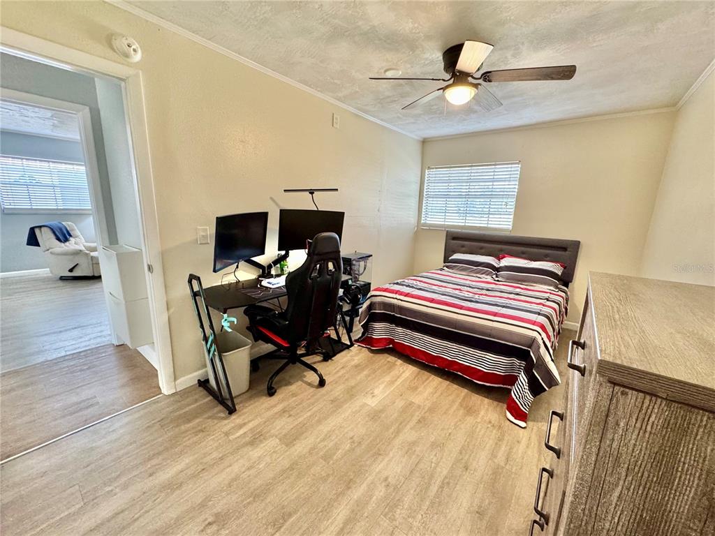 7625 East Misty Lane Inverness, FL 34450 - Photo 37 of 58 a bedroom with a workspace