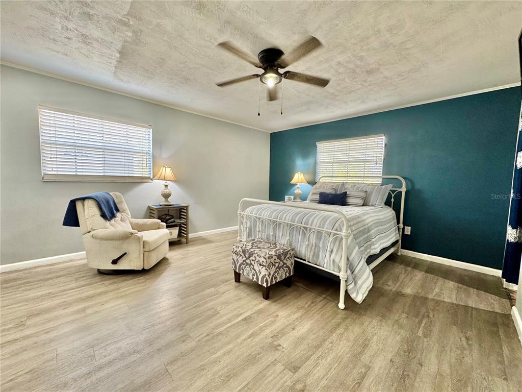 7625 East Misty Lane Inverness, FL 34450 - Photo 39 of 58 a bedroom with bed and window