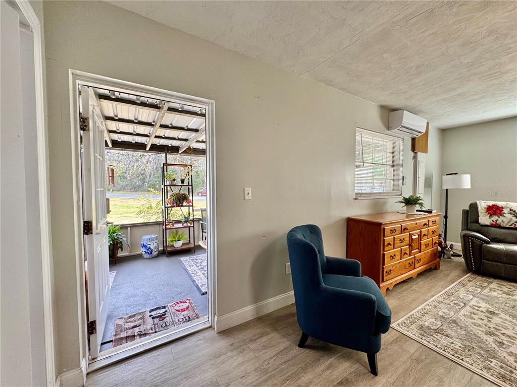 7625 East Misty Lane Inverness, FL 34450 - Photo 50 of 58 a bedroom with furniture and a window