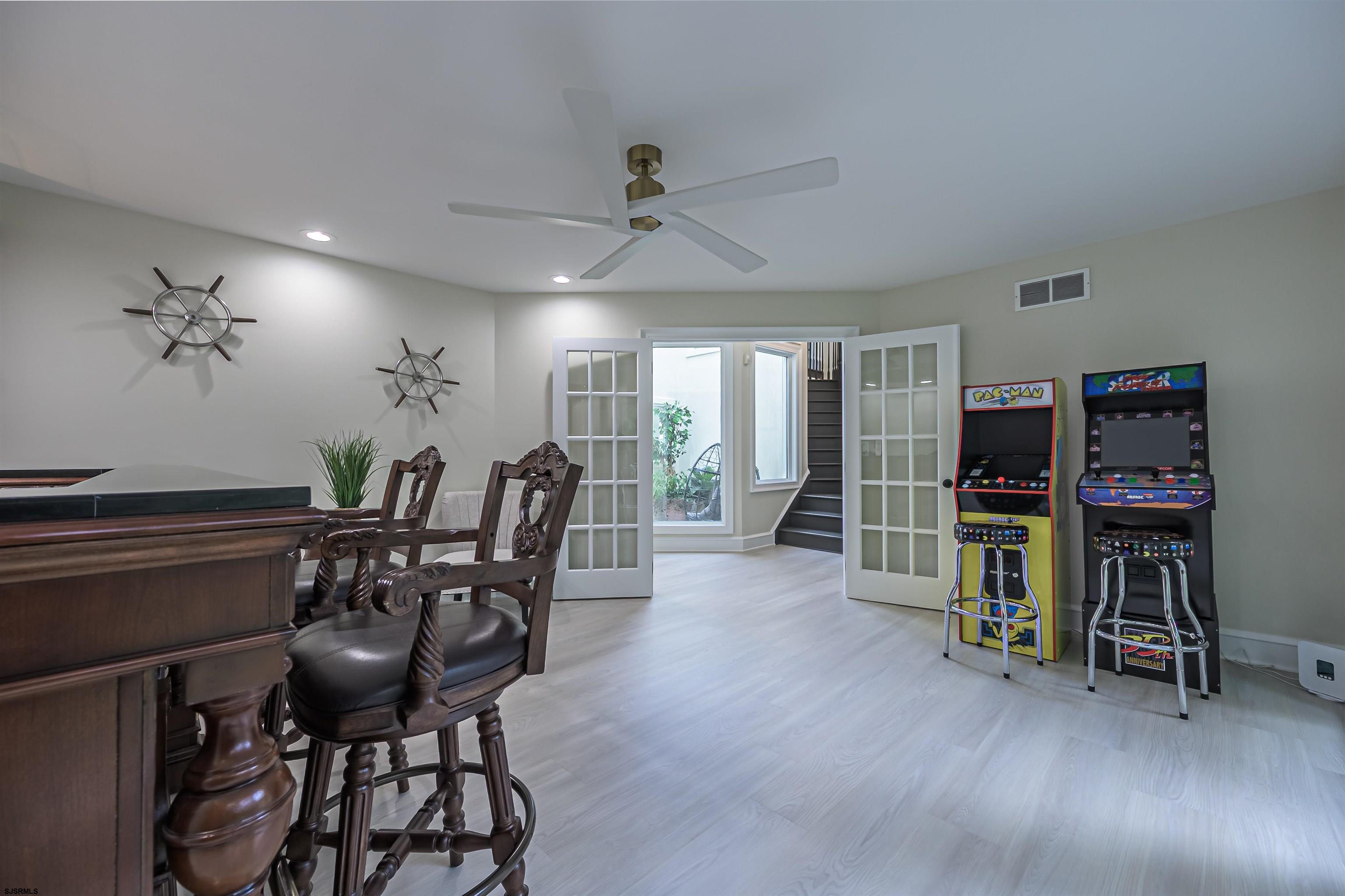 1303 West Riverside Drive Mays Landing, NJ 08330 - Photo 25 of 50 a view of a livingroom with furniture and a flat screen tv