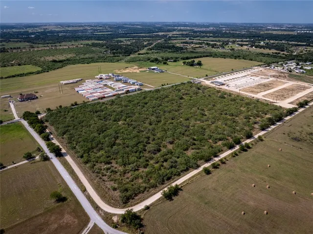 a view of a pool with a yard