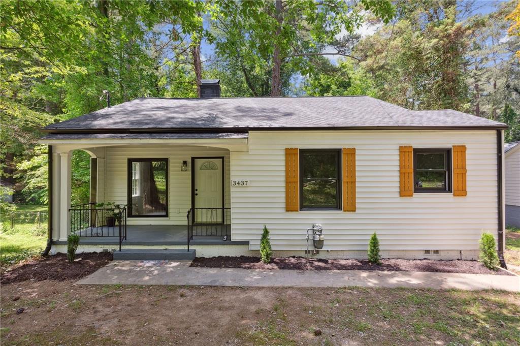3437 Harris Drive Atlanta, GA 30337 - Photo 1 of 1 a view of a house with a yard