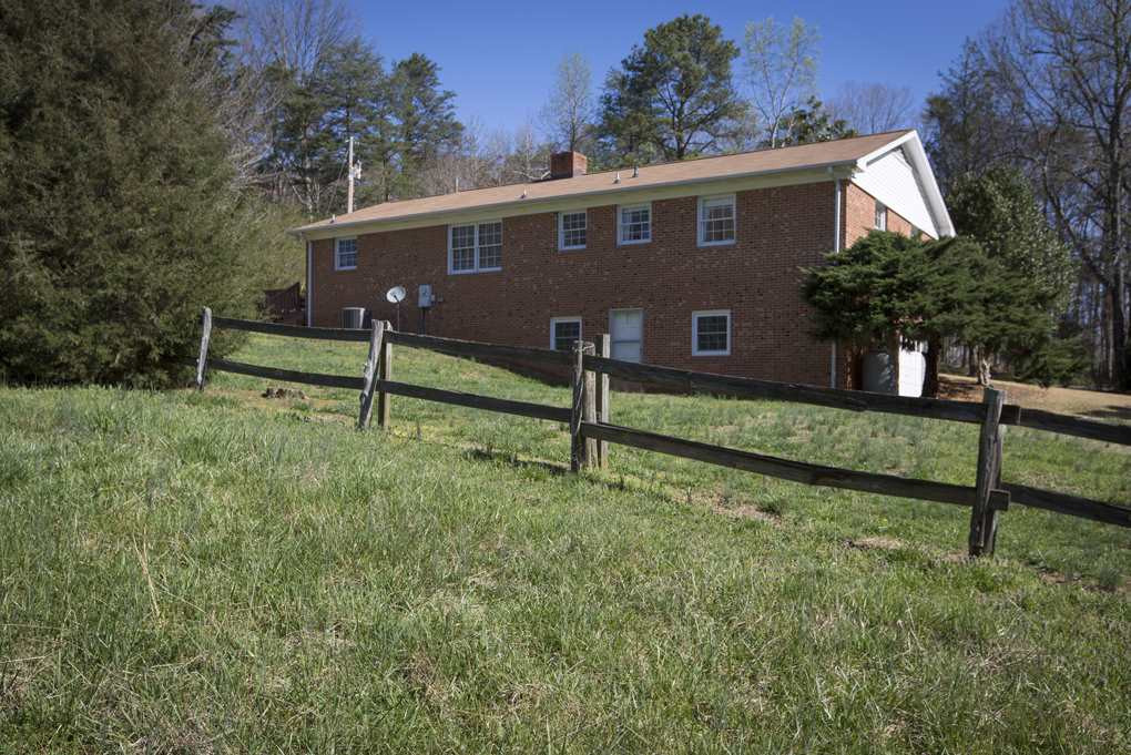 9313 Quail Roost Road Bahama, NC 27503 - Photo 25 of 25 Rear View of House with Side View of Garage