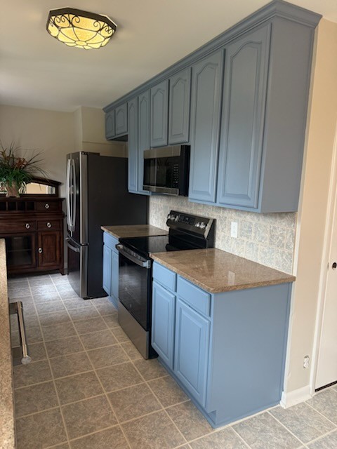 310 Santa Rosa Drive Old Hickory, TN 37138 - Photo 12 of 29 a kitchen with a refrigerator stove and microwave