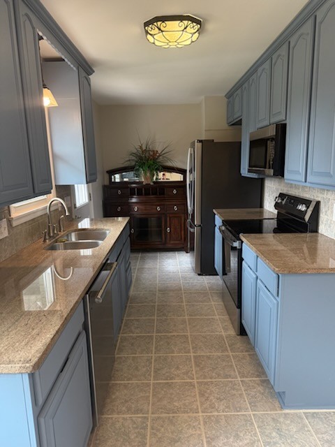 310 Santa Rosa Drive Old Hickory, TN 37138 - Photo 13 of 29 a kitchen with a sink a counter top space cabinets and stainless steel appliances