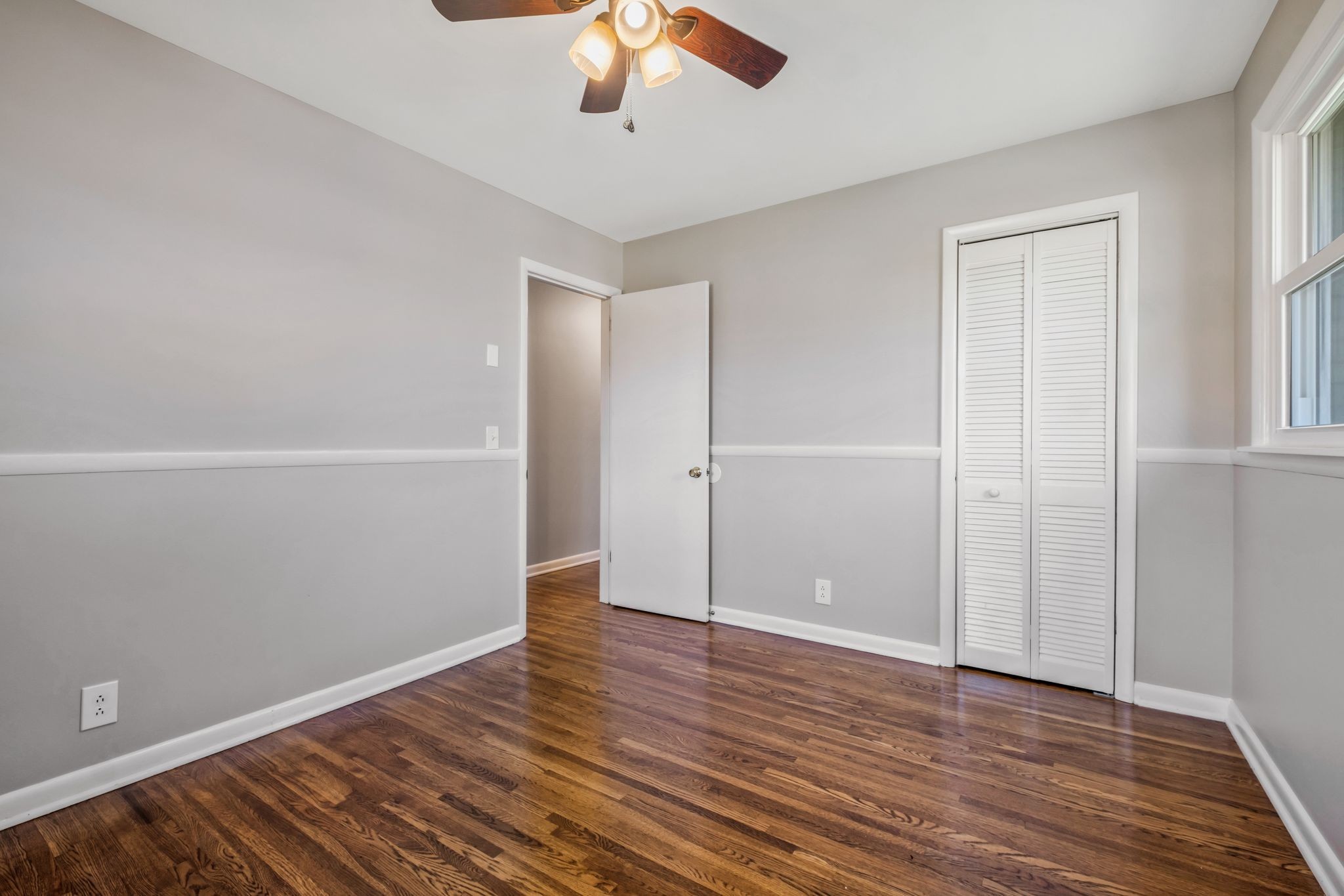 310 Santa Rosa Drive Old Hickory, TN 37138 - Photo 23 of 29 an empty room with wooden floor closet and windows