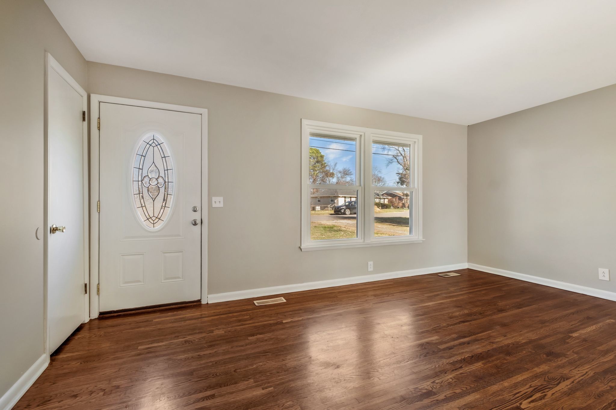 310 Santa Rosa Drive Old Hickory, TN 37138 - Photo 4 of 29 a view of an empty room with wooden floor and window