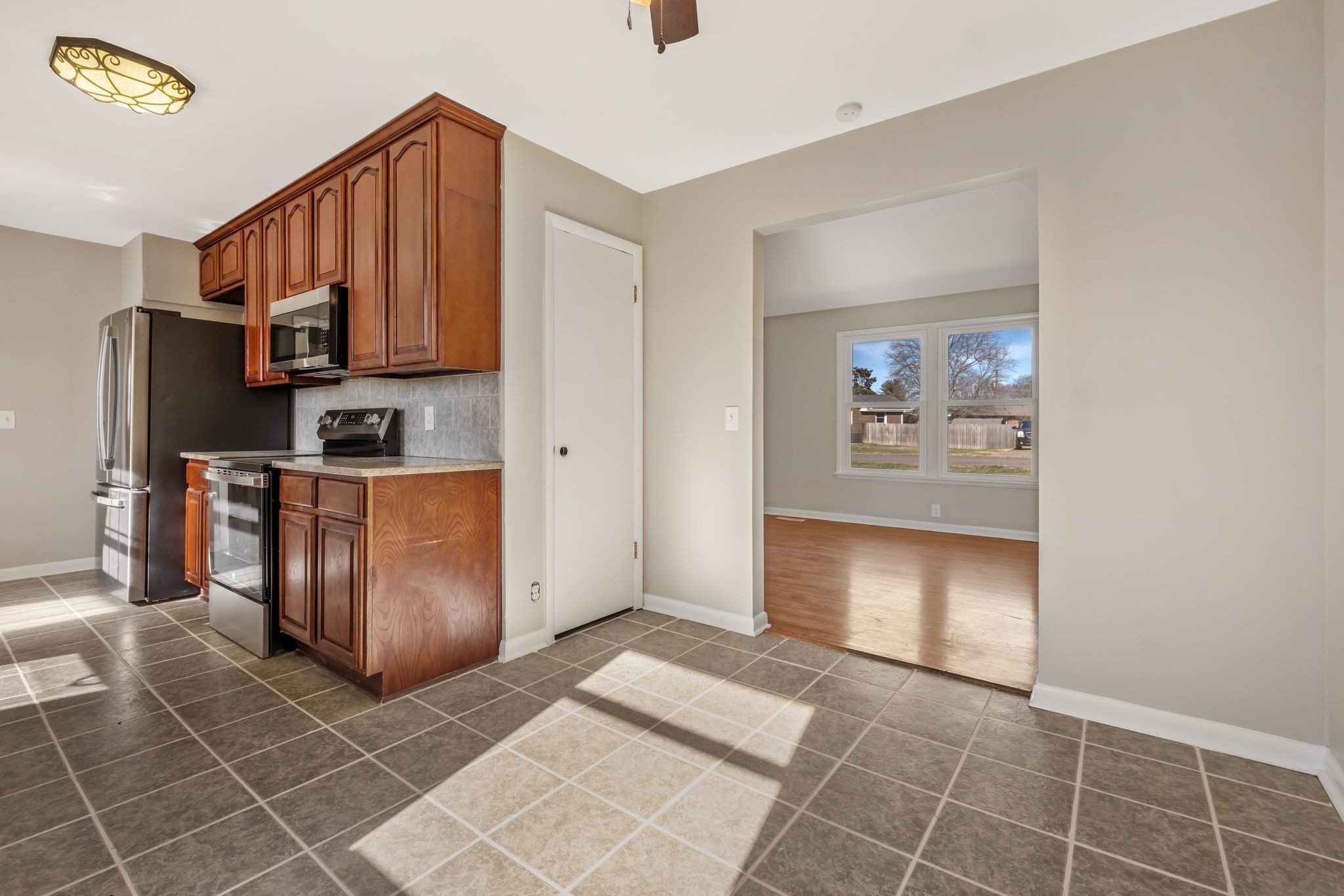 310 Santa Rosa Drive Old Hickory, TN 37138 - Photo 8 of 29 a kitchen with stainless steel appliances granite countertop a refrigerator a stove and a sink