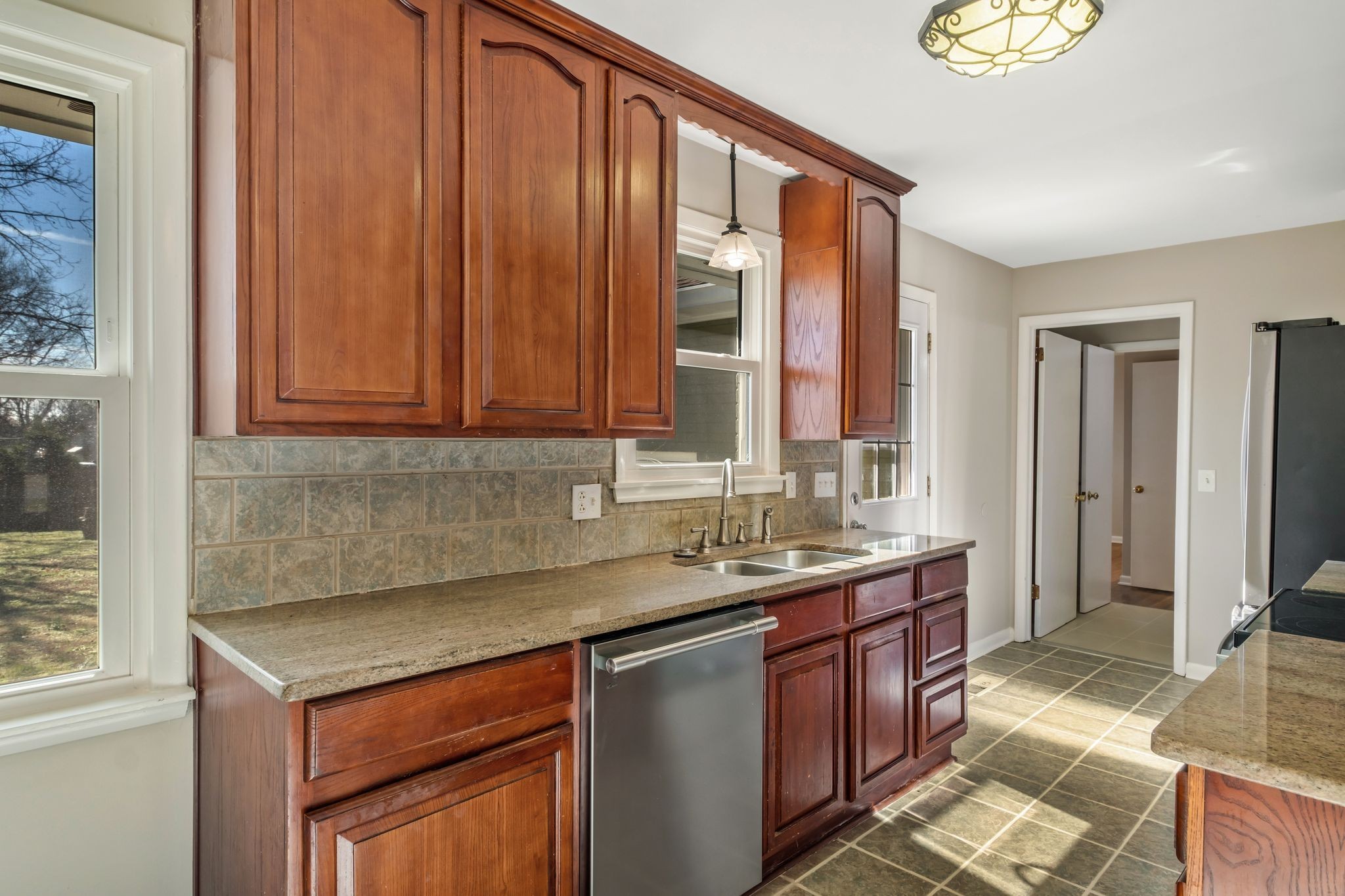 310 Santa Rosa Drive Old Hickory, TN 37138 - Photo 9 of 29 a kitchen that has a sink and a stove in it