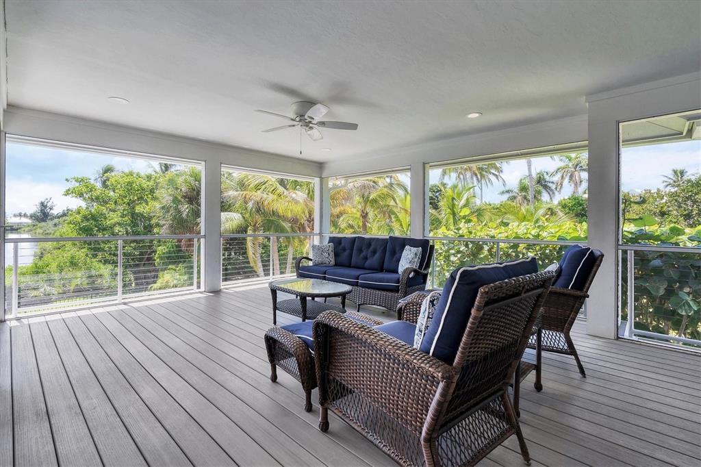 4010 40th Street West Boca Grande, FL 33921 - Photo 27 of 48 a living room with furniture and a large window