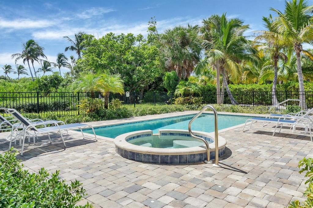 4010 40th Street West Boca Grande, FL 33921 - Photo 45 of 48 a view of a swimming pool with a yard