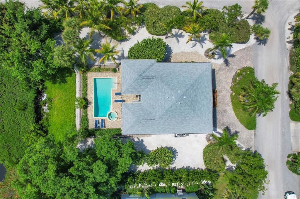 4010 40th Street West Boca Grande, FL 33921 - Photo 47 of 48 an aerial view of a house with a garden